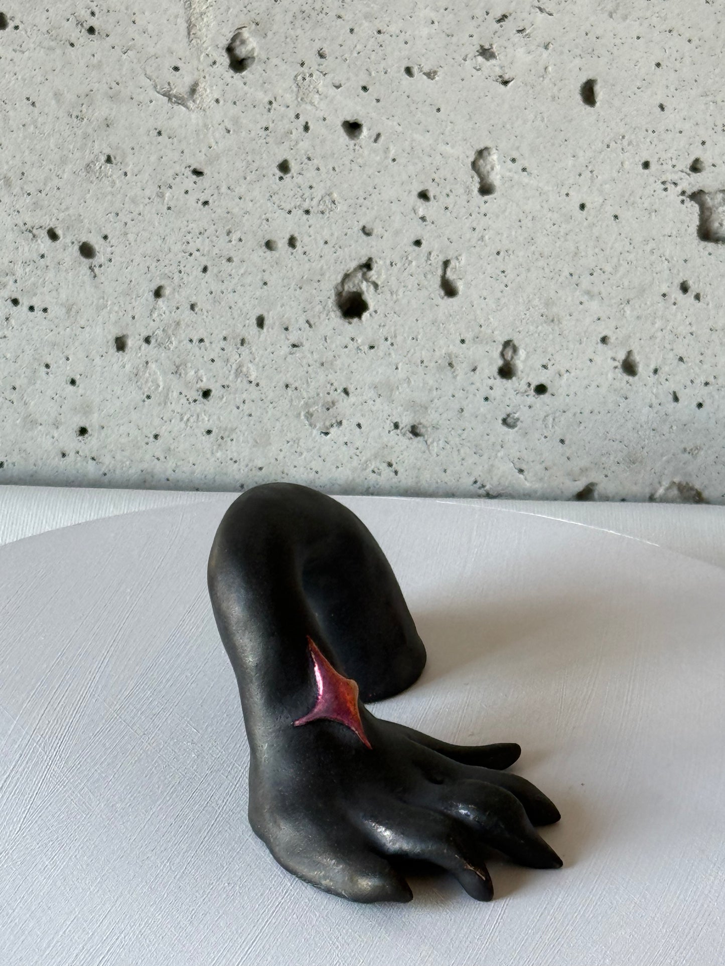 "mystery hand"